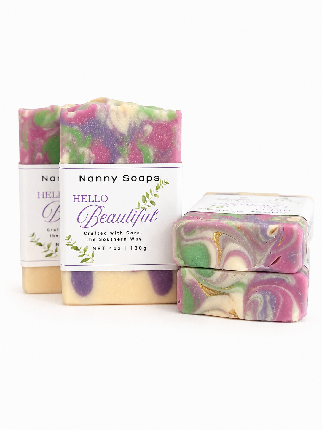 Nanny Soaps with colorful swirled design on a white background