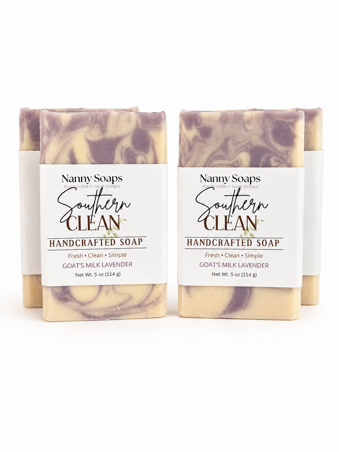 Two bars of Nanny Soaps Southern Clean handcrafted soap on a white background