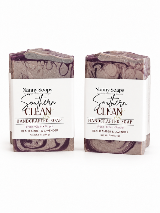 Two bars of Nanny Soaps Southern Clean handcrafted soap on a white background