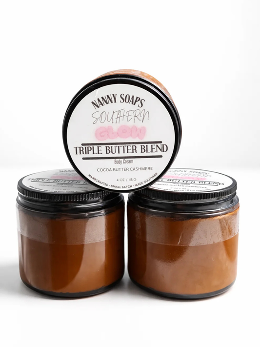 Three circular jars of Nanny Soaps Southern Glow Triple Butter Blend, scented cocoa butter cashmere